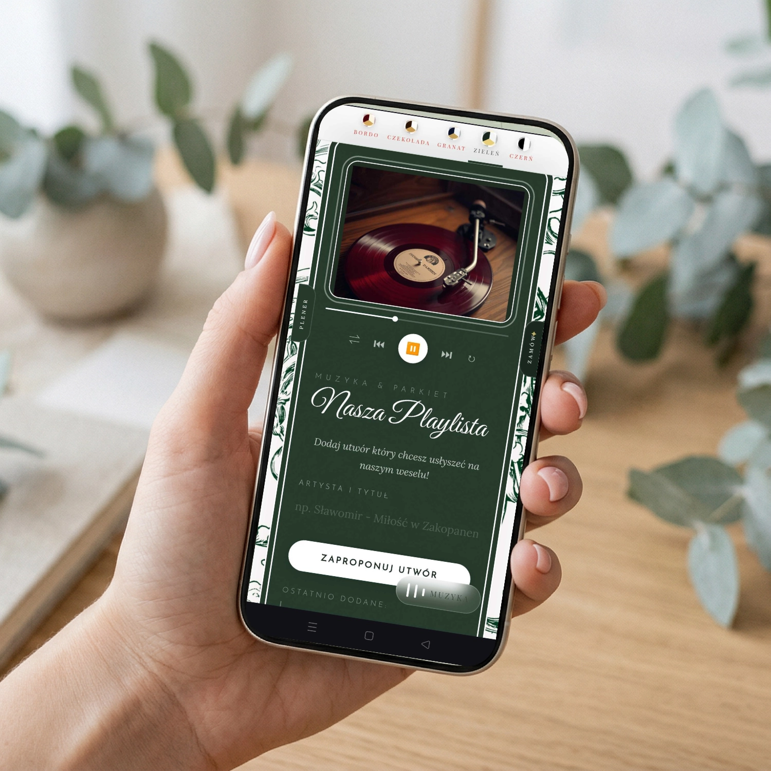 Cyfrowe zaproszenie ślubne ANM Collective na telefonie z funkcją playlisty życzeń gości
